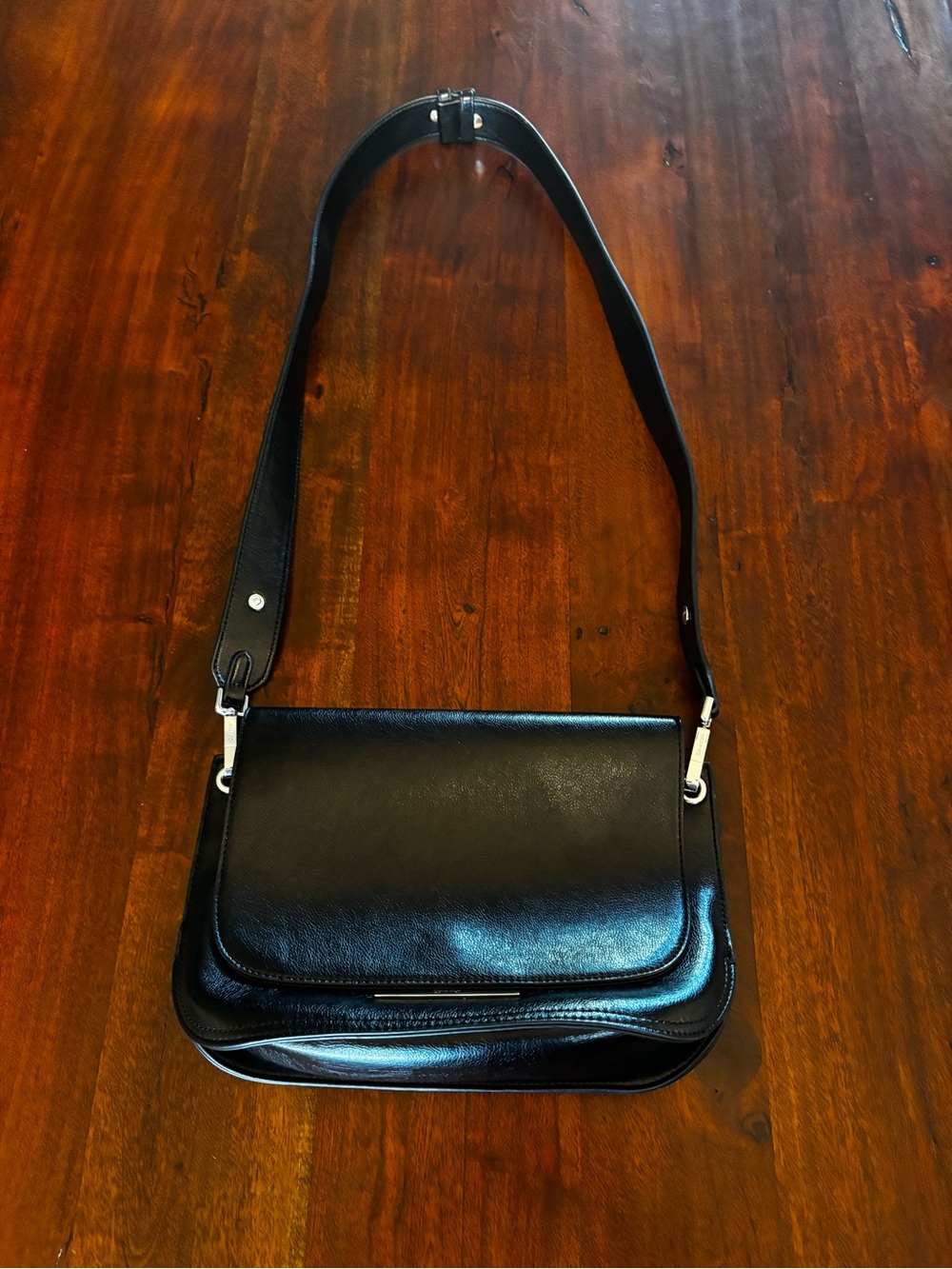 Calvin Klein Comet Crossbody Black Leather Shoulder Bag with Silver Hardware